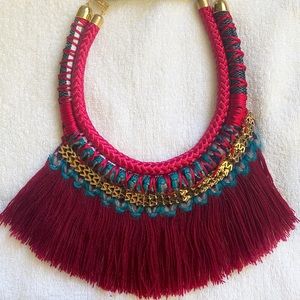Bohemian multi color and layered necklace .
